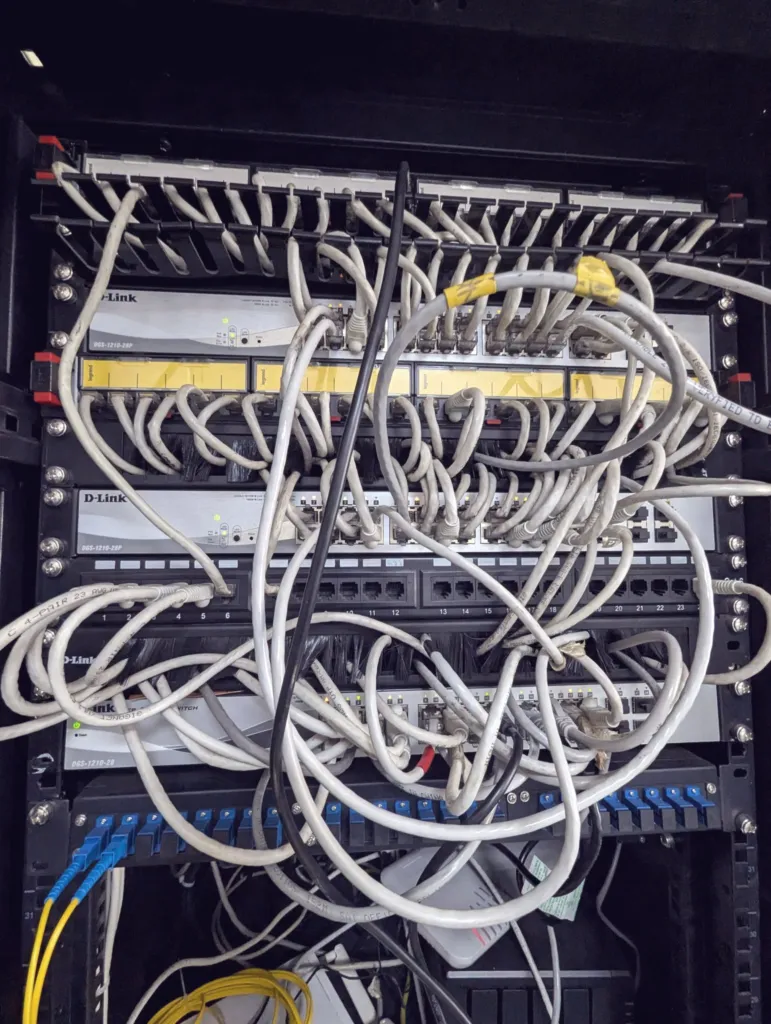 Tangled network cables in a rack